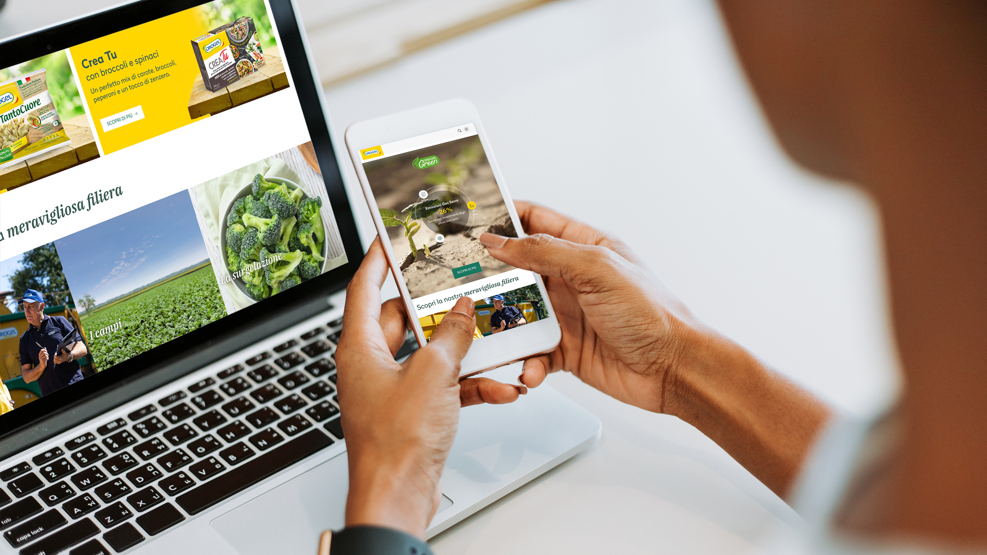 Woman using laptop and smartphone OROGEL