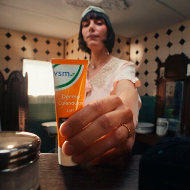 Woman grabbing a tube od VSM