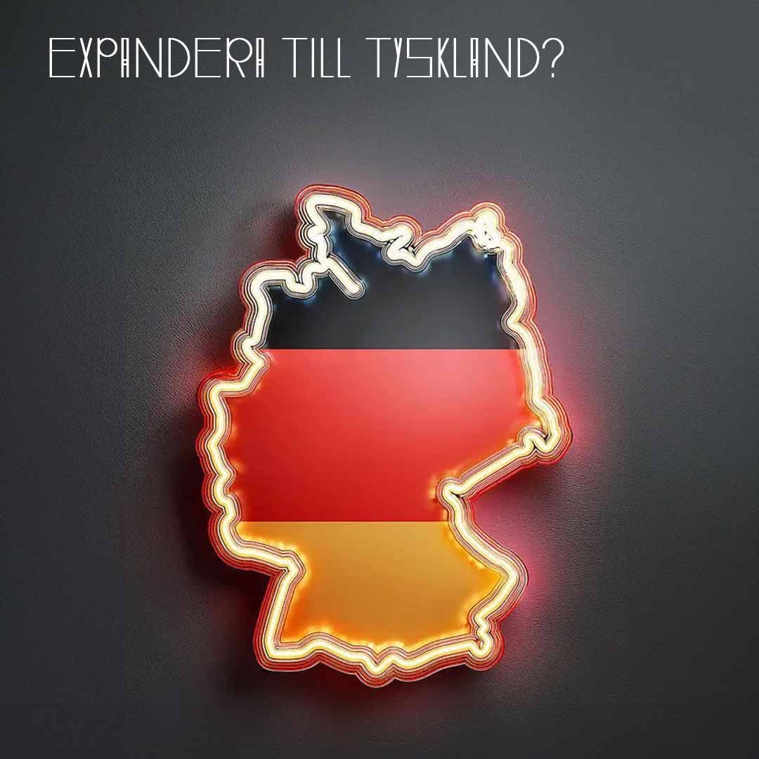 en karta av tyskland i neon. Text: Expandera till Tyskland?