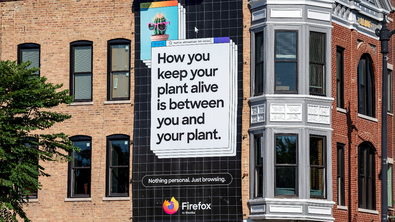 Image of a poster for Mozilla on a house wall